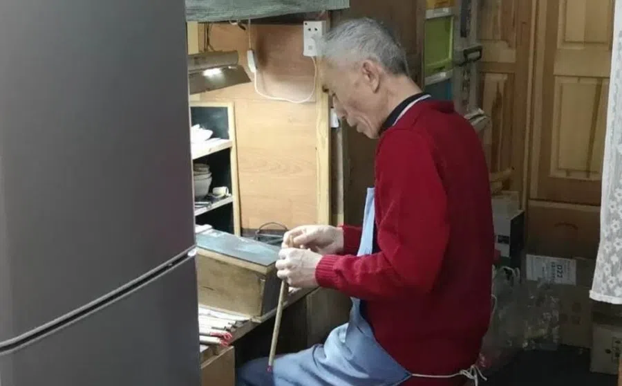 Mr Hu Chengming's ink brush store is one of the traditional craft stores that moved into the hutong following the redevelopment of Yangmeizhu Xiejie. (Photo: Meng Dandan)