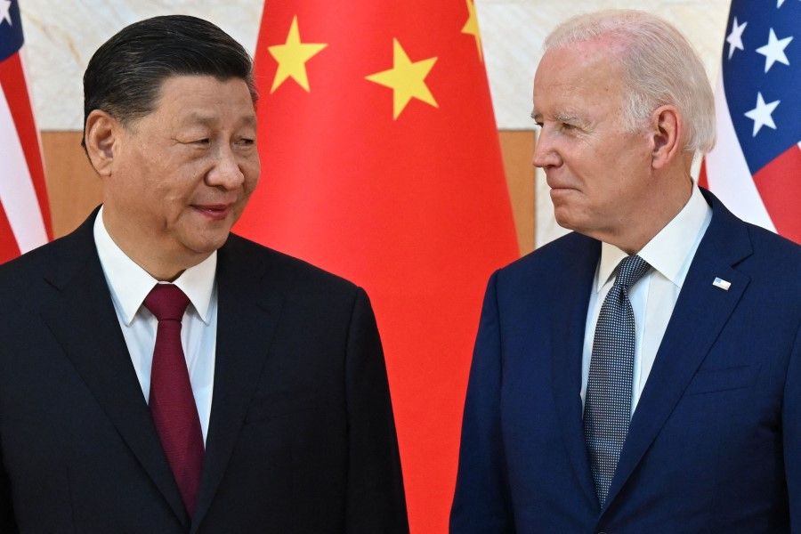 US President Joe Biden (R) and China's President Xi Jinping (L) meet on the sidelines of the G20 Summit in Nusa Dua on the Indonesian resort island of Bali on 14 November 2022. Chinese President Xi Jinping arrived in San Francisco on 14 November 2023. (Saul Loeb/AFP)