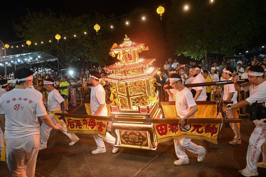 Devotees observed the Nine Emperor Gods Festival Send-off ceremony near Pulau Punggol Timor in Singapore on 23 October 2023. (SPH Media)