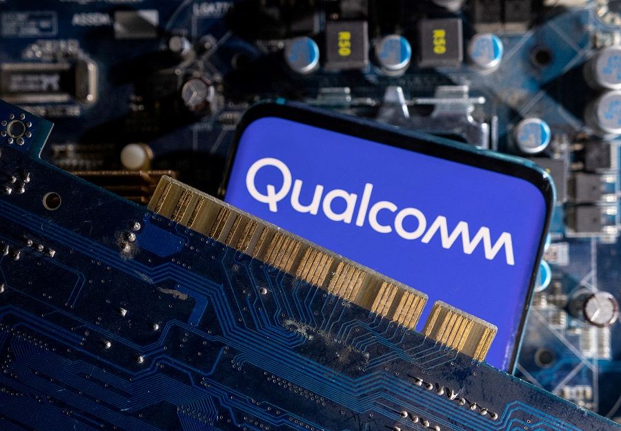 A smartphone with a displayed Qualcomm logo is placed on a computer motherboard in this illustration taken on 6 March 2023. (Dado Ruvic/Illustration/File Photo/Reuters)