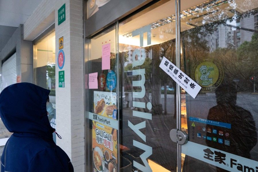 This photo taken on 31 March 2022 shows a shop sealed off during a Covid-19 lockdown in the Puxi area of Shanghai. (AFP)
