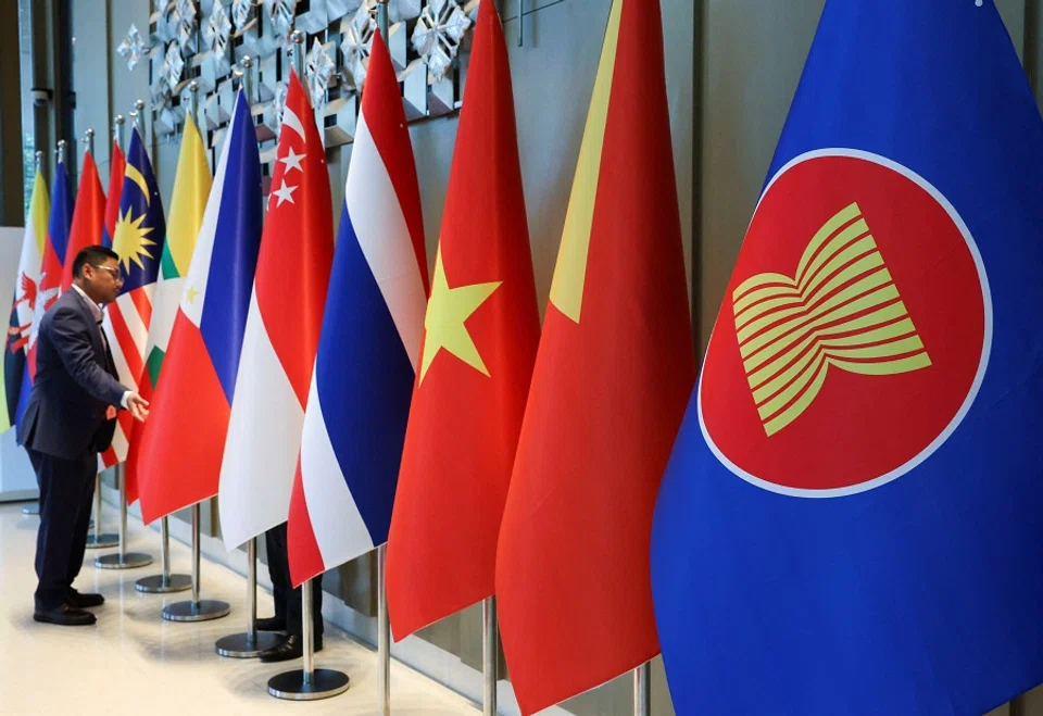 The ASEAN flag is placed alongside the flags of its member countries ahead of the ASEAN Foreign Ministers’ Retreat in Langkawi, Malaysia, on 17 January 2025. (Hasnoor Hussain/Reuters)
