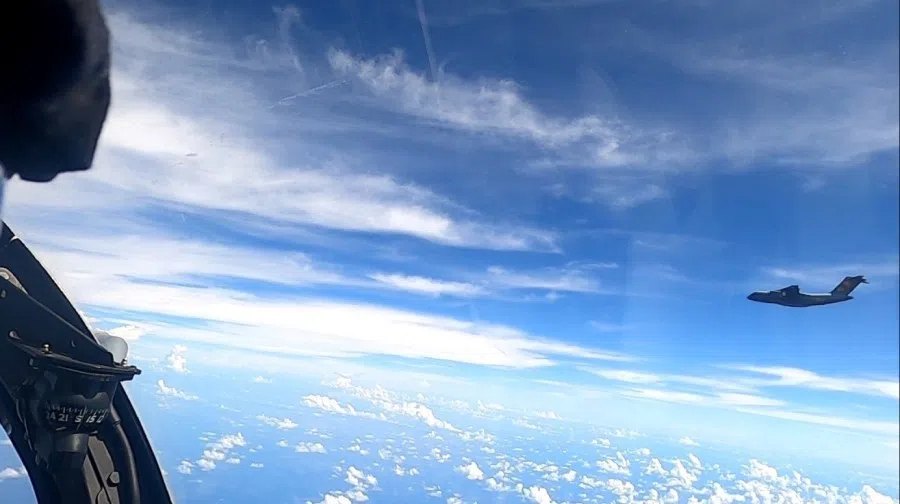 A plane with a Chinese flag on its tail is seen in this handout picture, 31 May 2021, obtained by Reuters 2 June 2021. (Royal Malaysian Air Force/Handout via Reuters)