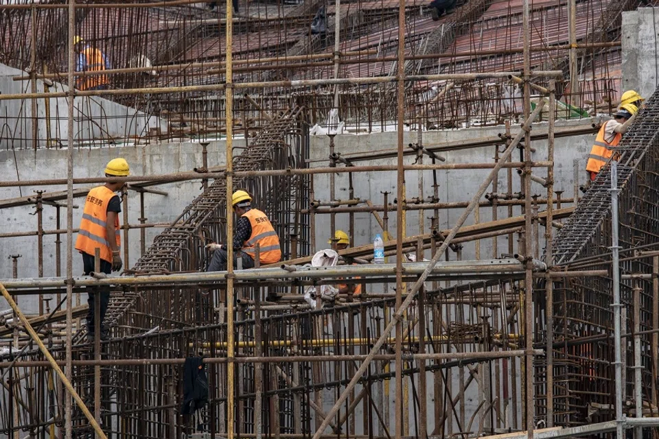 Workers at a construction site for the World Expo Cultural Park in Shanghai, China, on 27 September 2022. (Qilai Shen/Bloomberg)