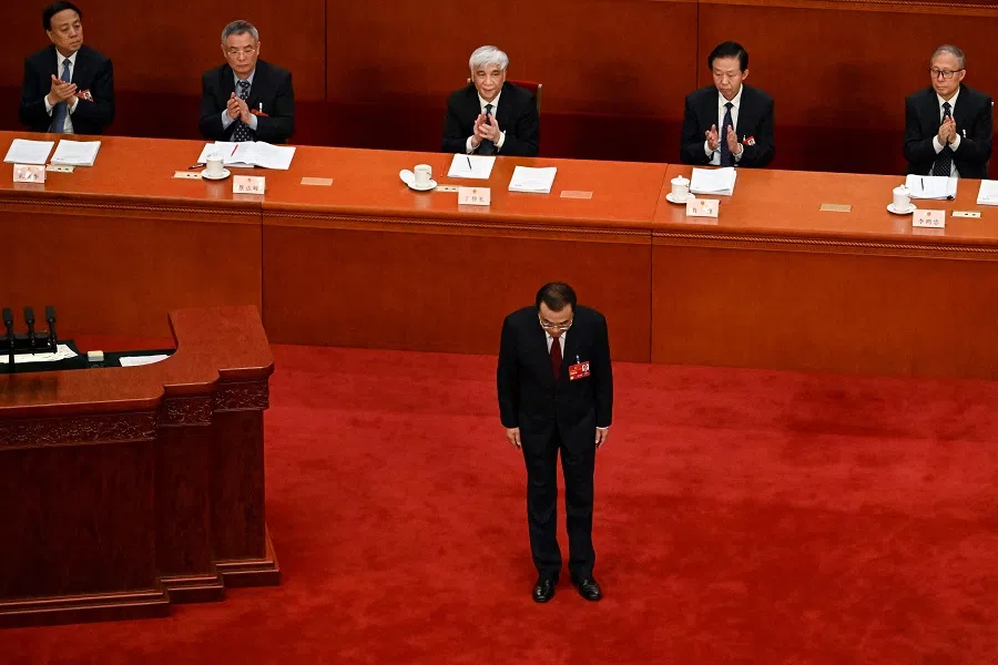 Chinese Premier Li Keqiang bows to delegates after delivering his work report during the opening session of the National People's Congress (NPC) at the Great Hall of the People in Beijing, China, on 5 March 2023. (Noel Celis/AFP)