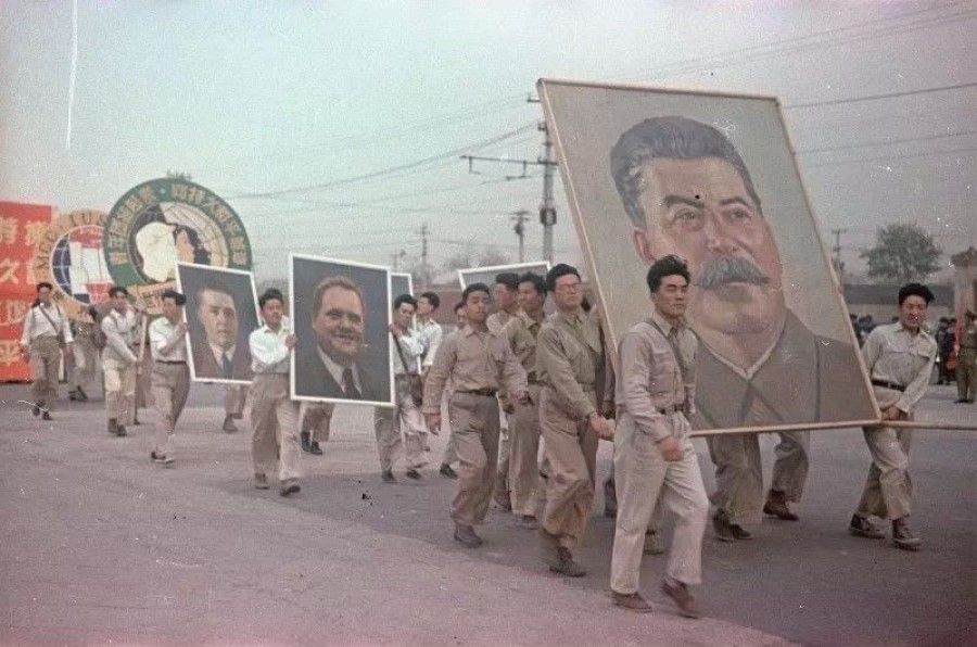 People carrying Marshal Stalin's portrait at the grand ceremony. (Photo taken by Vladislav Mikosha)