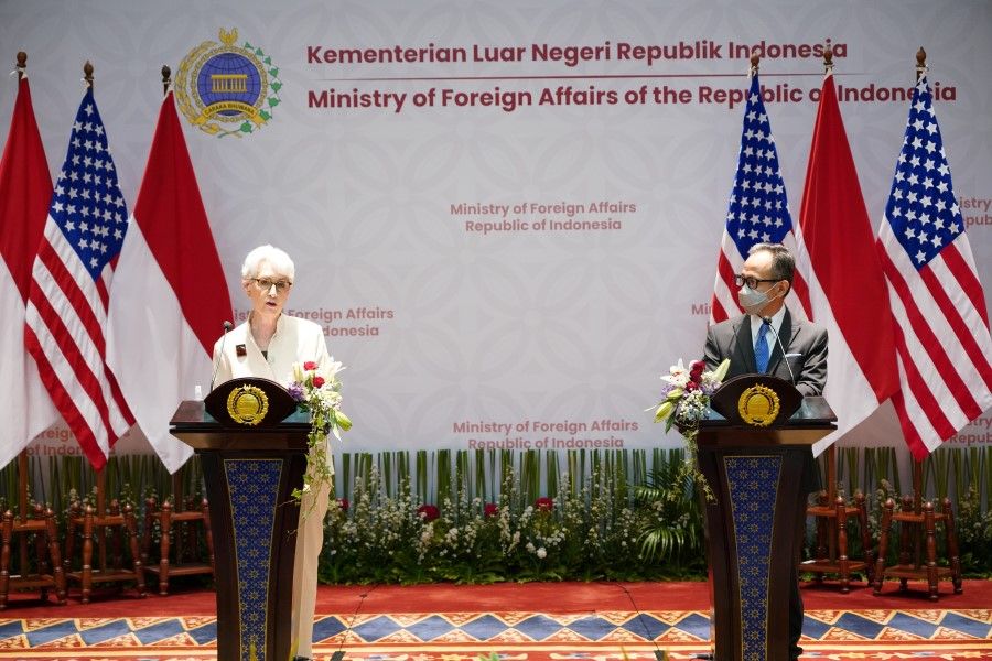 US Deputy Secretary of State Wendy Sherman speaks as Indonesian Deputy Foreign Minister Mahendra Siregar listens during a press briefing following their meeting in Jakarta, Indonesia, 31 May 2021. (Okta/Indonesia's Ministry of Foreign Affairs/Handout via Reuters)