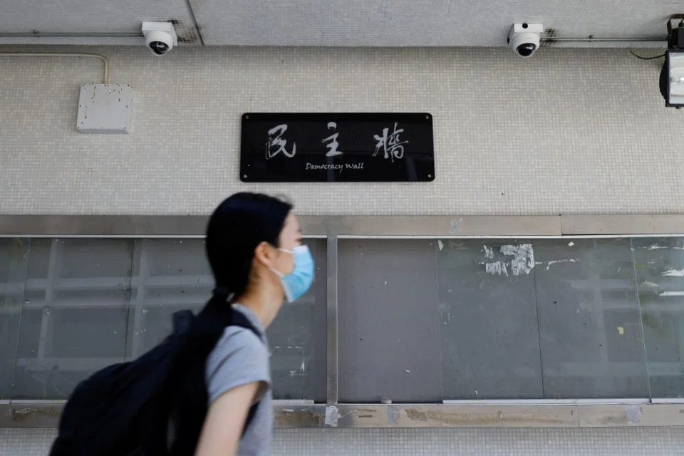 CCTV cameras are seen above Democracy Wall at Hong Kong University, in Hong Kong, China, 19 October 2021. (Tyrone Siu/Reuters)