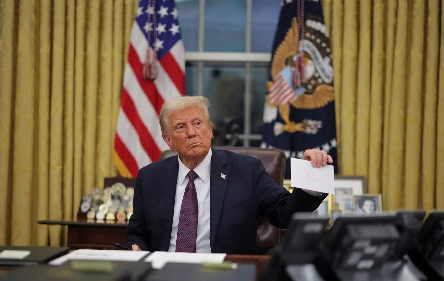 US President Donald Trump in the Oval Office at the White House on Inauguration Day in Washington, US, on 20 January 2025. (Carlos Barria/Reuters)