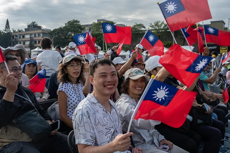 People hold the Taiwanese flags during the National Day celebration in Taipei, Taiwan, on 10 October 2026.