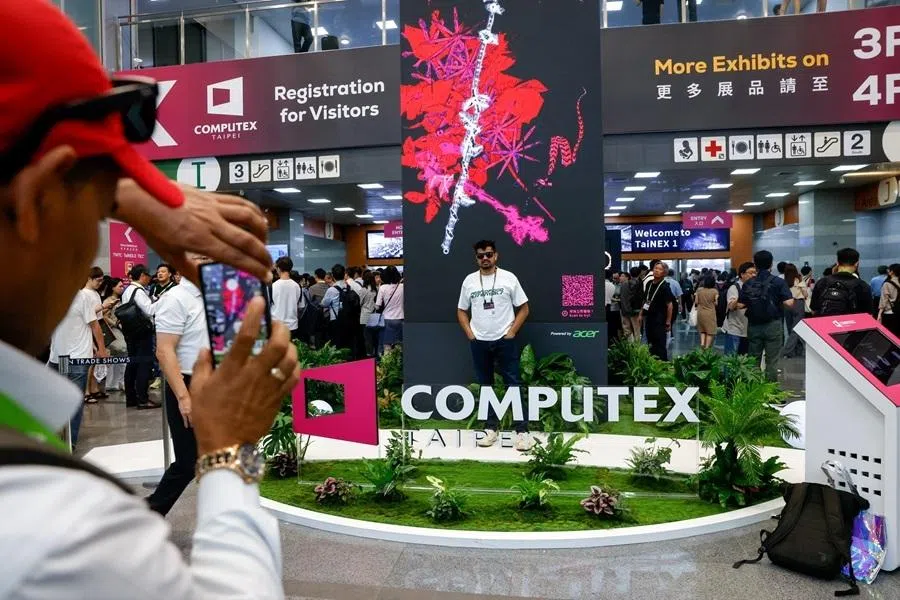 A person poses for a photo at the annual Computex trade show in Taipei, Taiwan, on 3 June 2026.