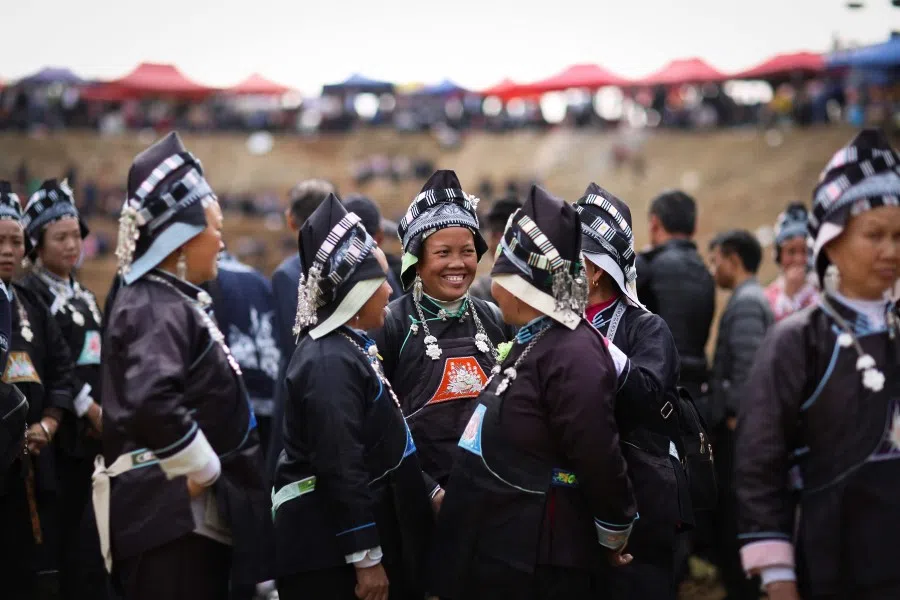 This photo taken on 7 November 2020 shows people in traditional costume attending an annual "Chixin" festival ceremony in celebration of this year's harvest in Danzhai County, in southwest China's Guizhou Province. Guizhou is one of the provinces that has seen a leadership change. (STR/AFP)