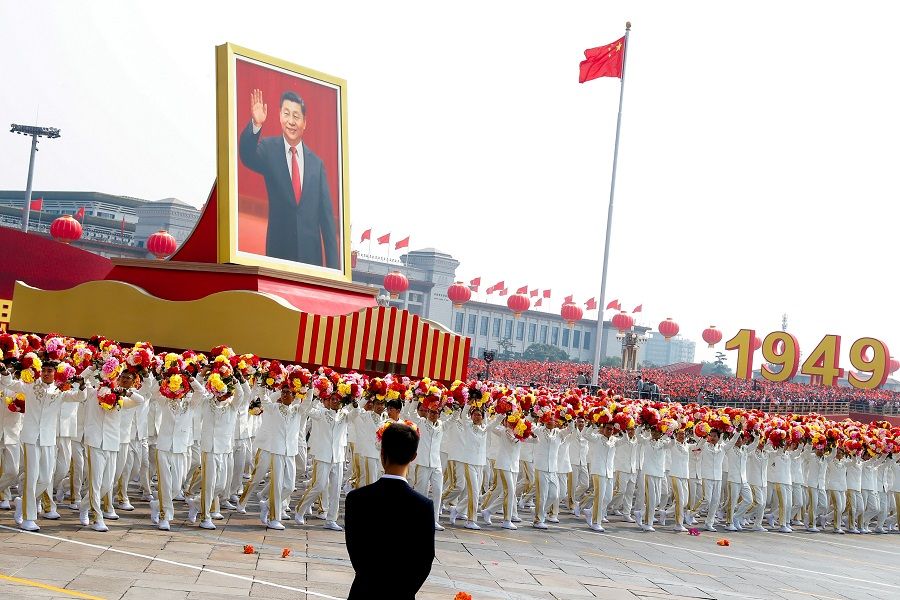 A float carrying a portrait of Chinese President Xi Jinping moves through Tiananmen Square during the parade marking the 70th founding anniversary of People's Republic of China, in Beijing, China, on 1 October 2019. (Thomas Peter/File Photo/Reuters)