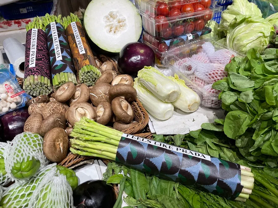 Vegetables wrapped in Prada packaging. (Photo: Chen Jing)