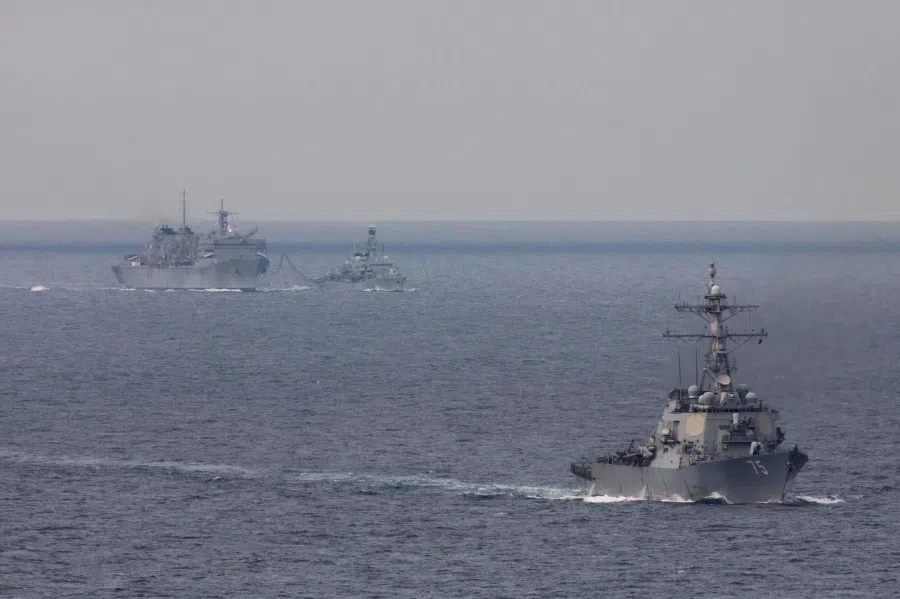 The USS Donald Cook (front) transits the Barents Sea as HMS Kent replenishes from the fast combat support ship USNS Supply while training in the Arctic Circle. (Dan Rosenbaum/US Navy/courtesy of the Royal Navy)