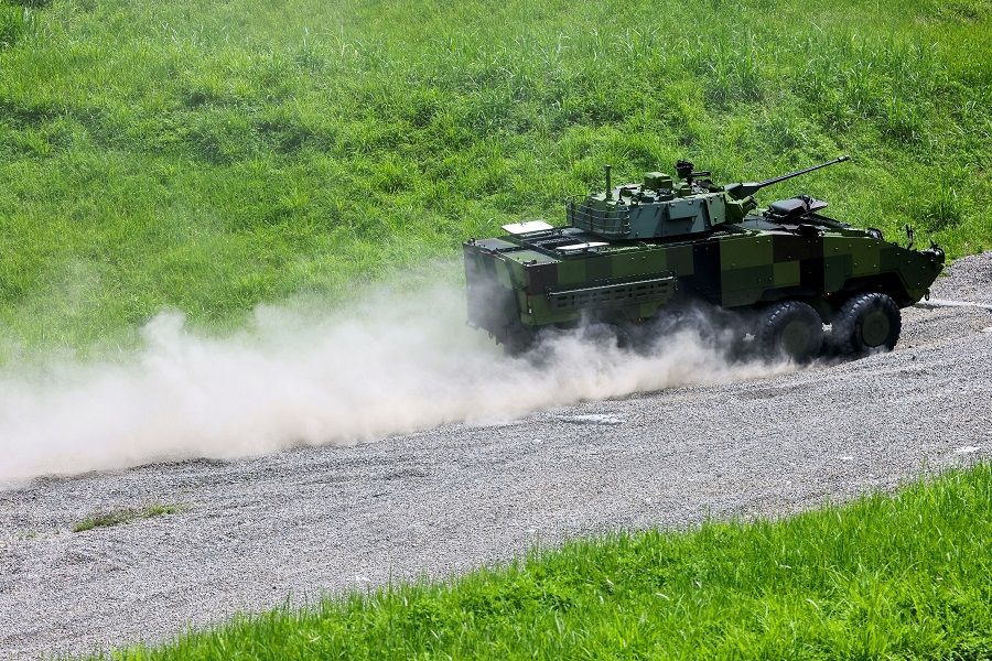 Taiwan military's latest armoured vehicle the CM-34 "Clouded Leopard" demonstrates driving on land with different incline and surface in Nantou, Taiwan, 16 June 2022. (Ann Wang/Reuters)