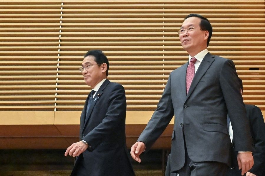 Vietnam's President Vo Van Thuong (right) and Japan's Prime Minister Fumio Kishida (left) arrive for a document exchange ceremony and joint press conference after their meeting at the prime minister's official residence in Tokyo on 27 November 2023. (Richard A. Brooks/AFP)
