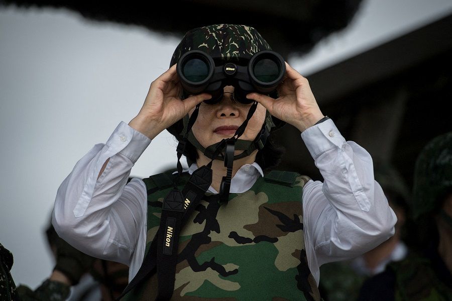 Taiwan's President Tsai Ing-wen looks through a pair of binoculars as she oversees a military drill during the Han Kuang annual exercise, in Penghu, Taiwan, 25 May 2017. (Taiwan Presidential Office/Handout via Reuters)