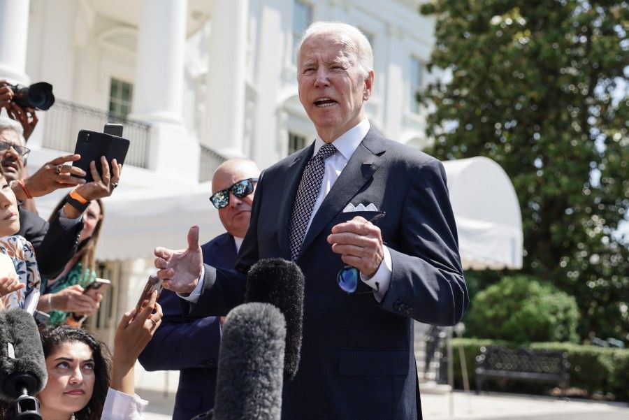 US President Joe Biden speaks with members of the media before boarding Marine One for a weekend in Rehoboth, Delaware, at the White House in Washington, US, 17 June 2022. (Evelyn Hockstein/Reuters)