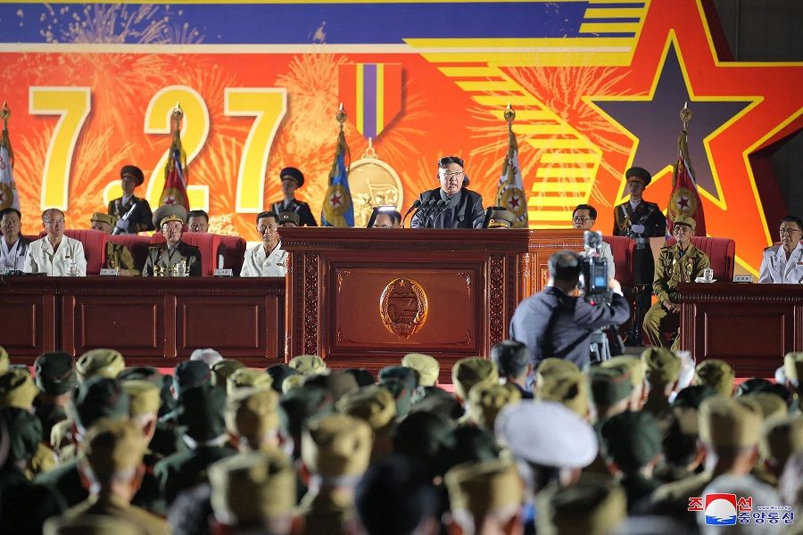 This picture taken on 27 July 2021 and released from North Korea's official Korean Central News Agency (KCNA) on 28 July 2021 shows North Korean leader Kim Jong-un making a speech in front of the Monument to the Victorious Fatherland Liberation War in Pyongyang to mark the 68th anniversary of the Korean War armistice. (STR/KCNA VIA KNS/AFP)