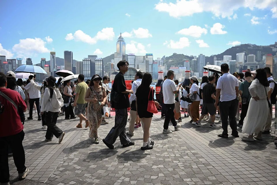 Tourists visit Victoria Harbour in Hong Kong on 2 October 2025. (Peter Parks/AFP)