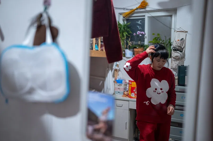 Sister Chen in her rented lodgings in Beijing.