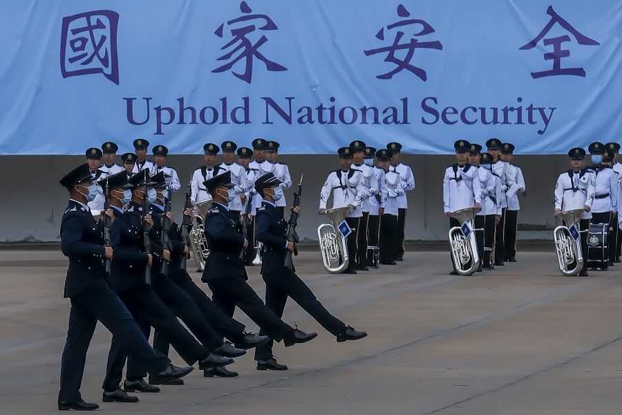 Police officers perform a drill during an open day for National Security Education Day at the Hong Kong Police College in Hong Kong, China, on 15 April 2021. (Paul Yeung/Bloomberg)