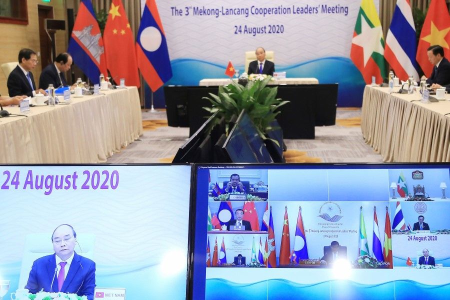 Vietnam's Prime Minister Nguyen Xuan Phuc (C) addresses leaders from the Mekong countries and China's Premier Li Keqiang during the 3rd Mekong-Lancang Cooperation Leaders Meeting, held online in Hanoi on 24 August 2020. (Quy Le Bui/AFP)