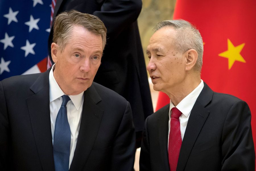 Pictured in this file photo taken on February 15, 2019, are US trade representative Robert Lighthizer (left) and Chinese Vice Premier Liu He. (Mark Schiefelbein/POOL/AFP)