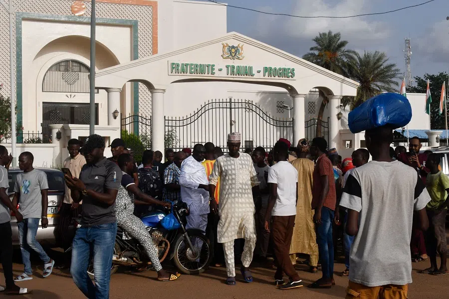 Demonstrators gather to protest the detention of President Mohamed Bazoum by the Presidential Guard in Niamey, Niger, on 26 July 2023. (AFP)