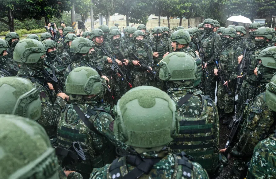 Taiwanese reservists gather to shout slogans after a pre-combat training during Taiwan’s annual Han Kuang military exercise in Taoyuan on 11 July 2025. (I-Hwa Cheng/AFP)