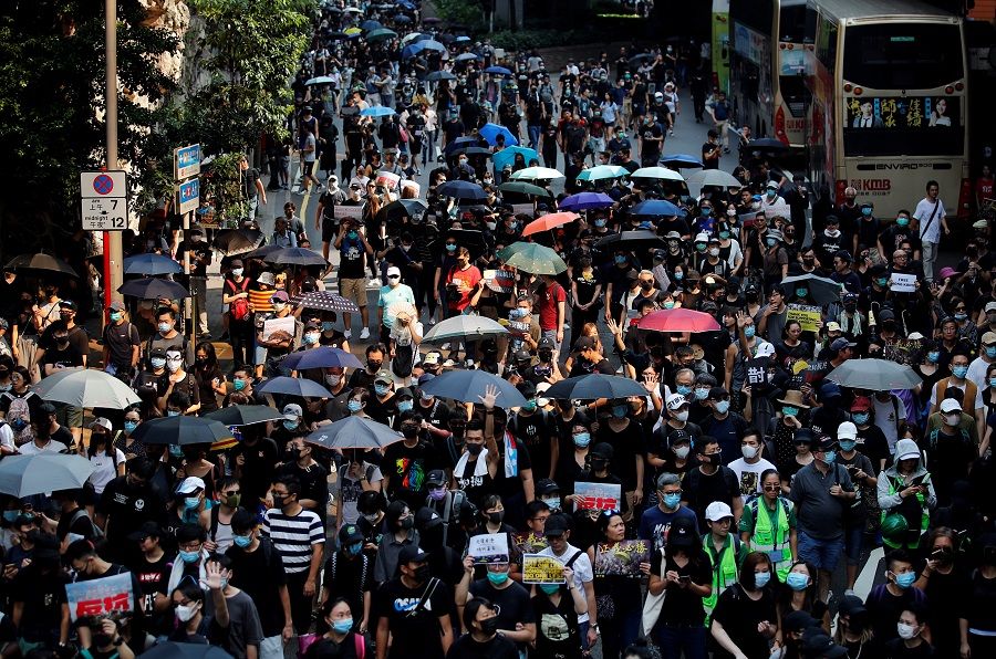 A protest march in Hong Kong (Umit Bektas / REUTERS)