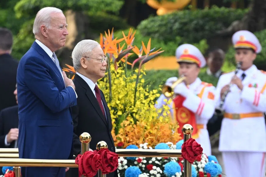 US President Joe Biden (left) attends a welcoming ceremony hosted by Vietnam's Communist Party General Secretary Nguyen Phu Trong (second from left) at the Presidential Palace of Vietnam in Hanoi on 10 September 2023. (Saul Loeb/AFP)