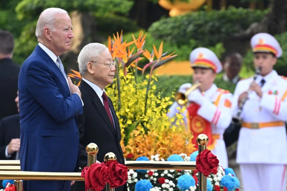US President Joe Biden attends a welcoming ceremony hosted by Vietnam's Communist Party General Secretary Nguyen Phu Trong (2L) at the Presidential Palace of Vietnam in Hanoi on 10 September 2023. (Saul Loeb/AFP)