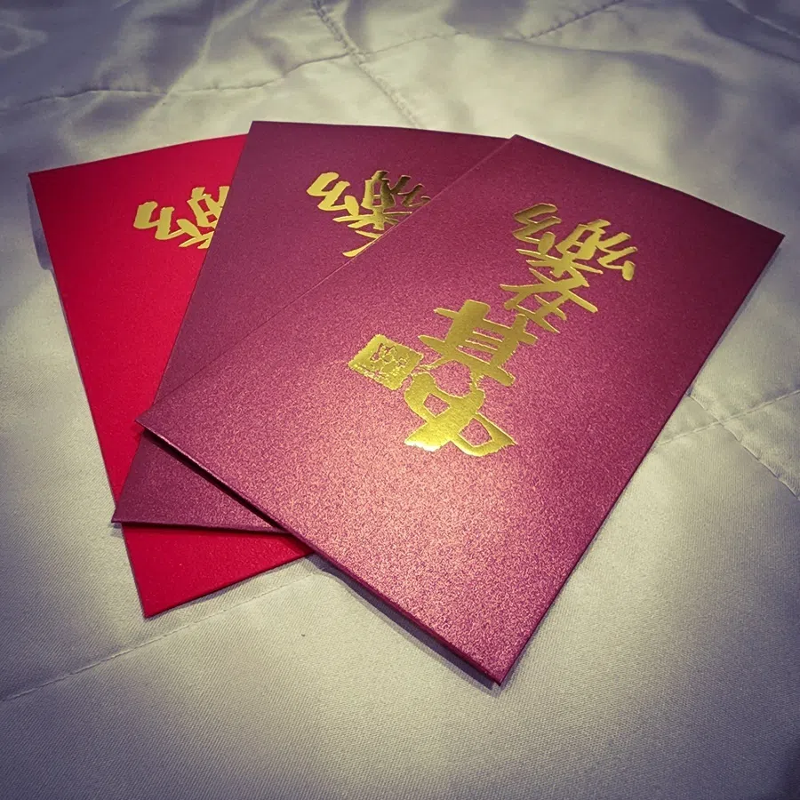 Even though I am happily single, I do give red packets to my family.