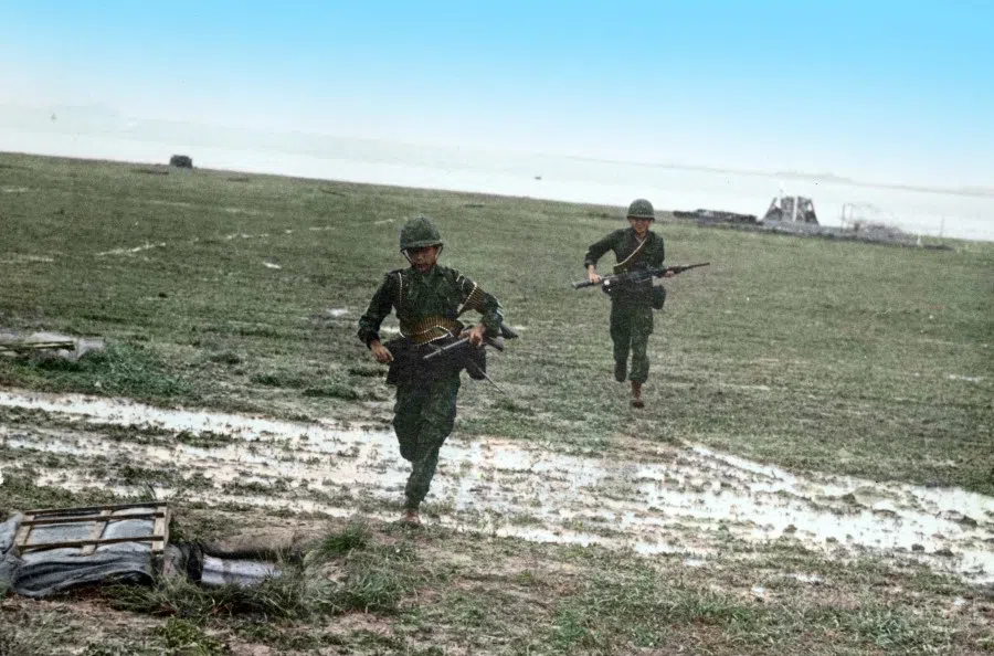 An outdoor training exercise of the armed forces in the 1970s, showing the army's combat capabilities.
