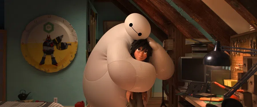 BayMax (left) with his human operator Hiro from the Disney movie Big Hero 6. (Disney)