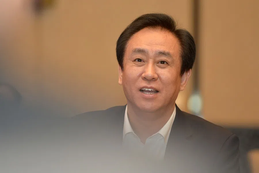 This photo taken on 5 June 2017 shows Evergrande's president Xu Jiayin, also known as Hui Ka Yan in Cantonese, attending a meeting in Wuhan, in China's central Hubei province.