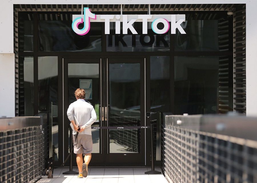 In this file photo taken on 27 August 2020, the TikTok logo is displayed in front of a TikTok office in Culver City, California. (Mario Tama/Getty Images North America/AFP)