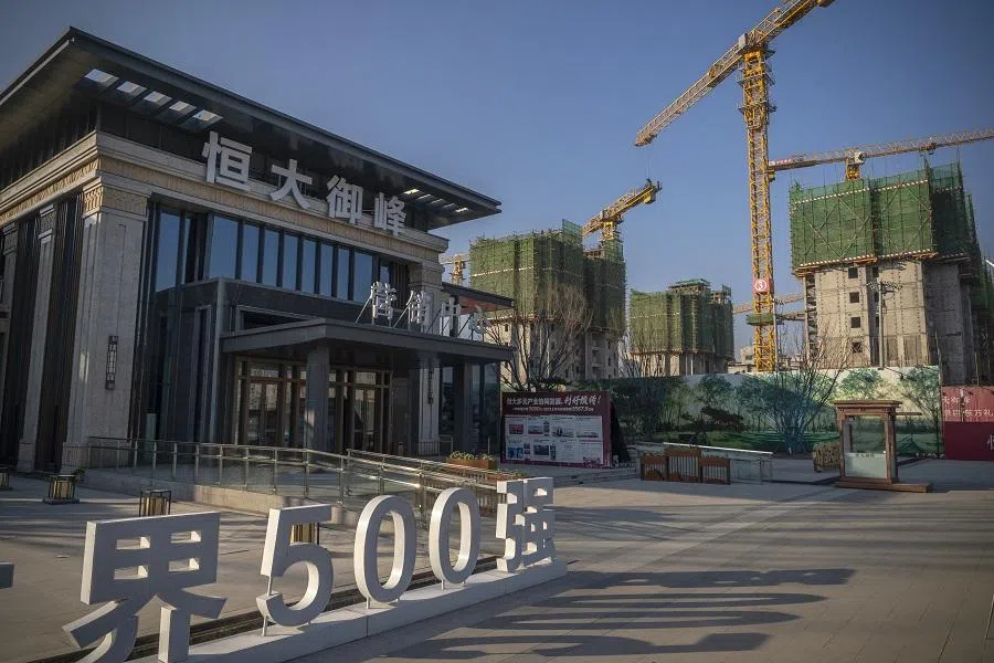The sale office in front of unfinished apartment buildings at the construction site of a China Evergrande Group development in Beijing, China, on 6 January 2021. (Andrea Verdelli/Bloomberg)