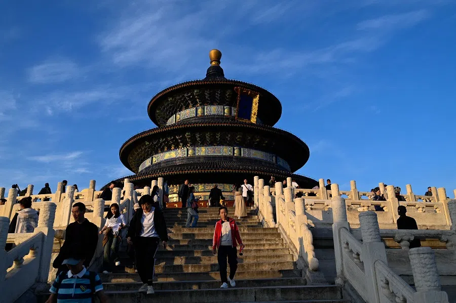 People visit the Temple of Heaven in Beijing on 10 October 2023. (Pedro Pardo/AFP)