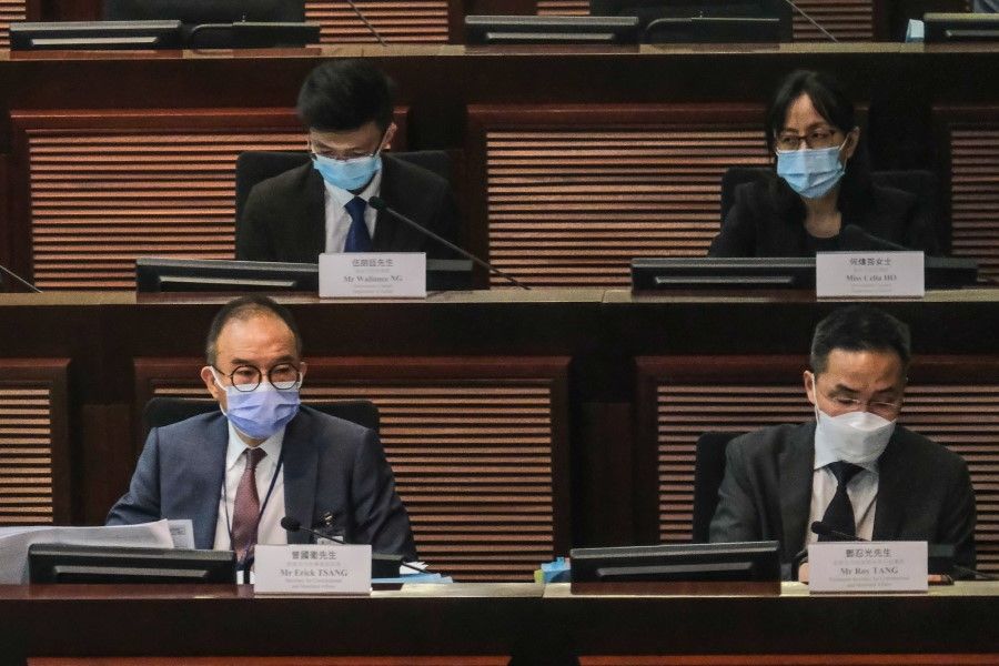Secretary for Constitutional and Mainland Affairs Erick Tsang (bottom left) and other officials respond to questions from LegCo representatives, 19 April 2021. (CNS)
