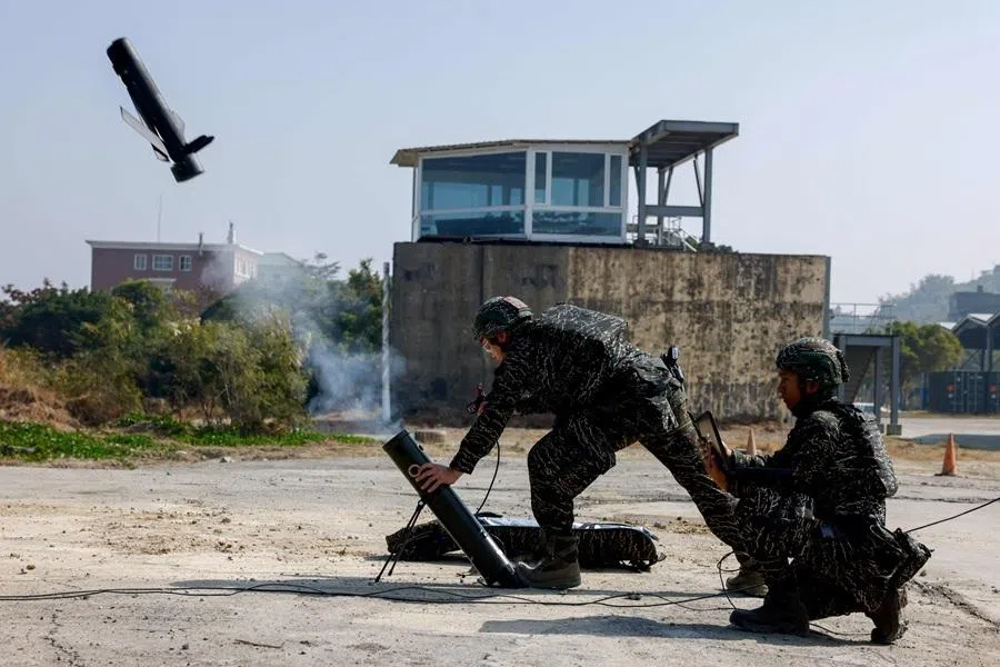 Soldiers operate a Taiwan-made attack drone during an annual military exercise, in Kaohsiung, Taiwan, 29 January 2026. (Ann Wang/Reuters)