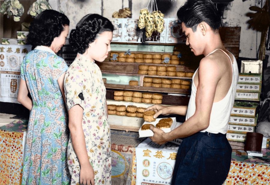 A salesperson in a cake shop in Singapore, handing out food samples in the 1960s. Cakes, biscuits and tarts are a traditional food item for the Chinese, and are often eaten as after-dinner dessert, and also given as gifts. Mooncakes and wedding pastries are part of important festivals and celebrations.