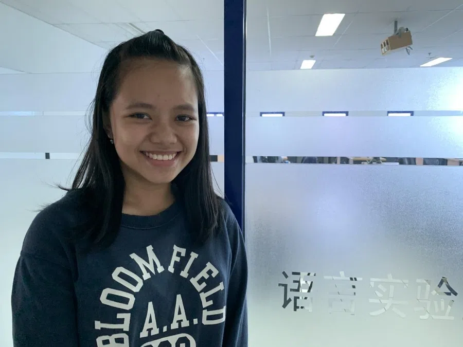 Liu Wanni speaks Indonesian and Hakka with her parents.