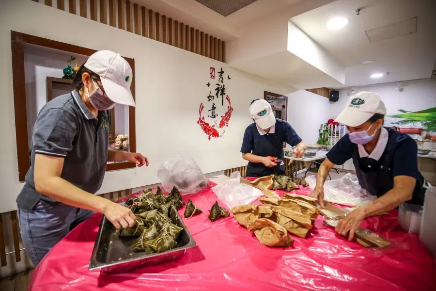 Volunteers from Tzu Chi Singapore were among those preparing food for delivery to various hospitals, 15 June 2020. (SPH Media)