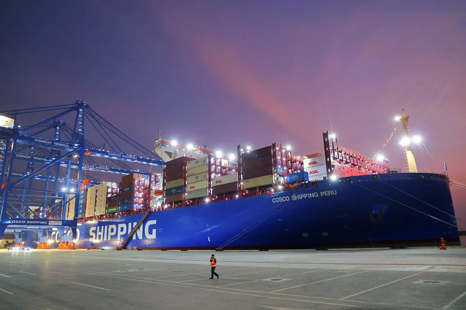 A man walks at China’s state-owned Cosco Shipping Chancay port inaugurated during the APEC summit, in Chancay, Peru, in this handout image released on 14 November 2024. (APEC Peru/Handout via Reuters)