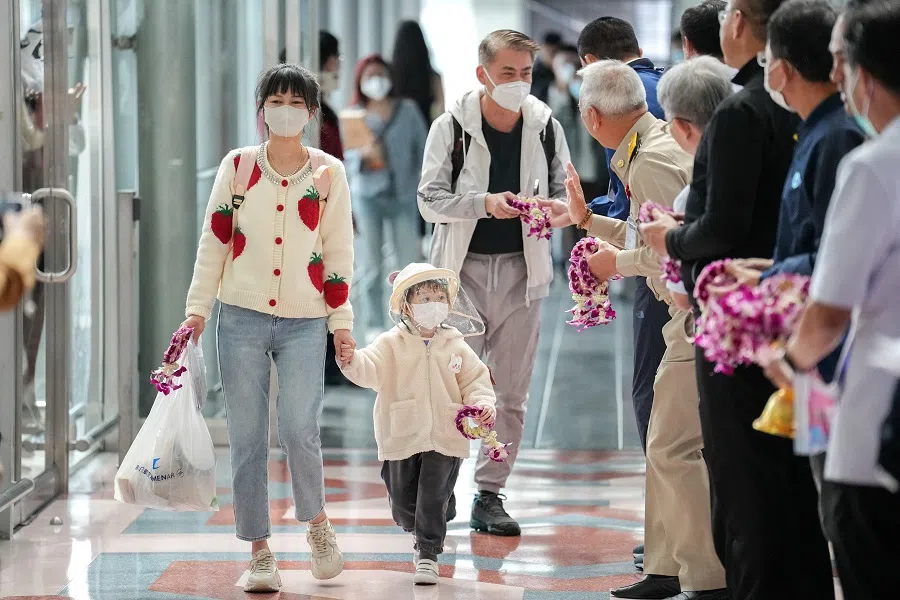 Passengers from China's Xiamen arrive at Bangkok's Suvarnabhumi airport after China reopens its borders amid the Covid-19 pandemic, in Bangkok, Thailand, 9 January 2023. (Athit Perawongmetha/Reuters)