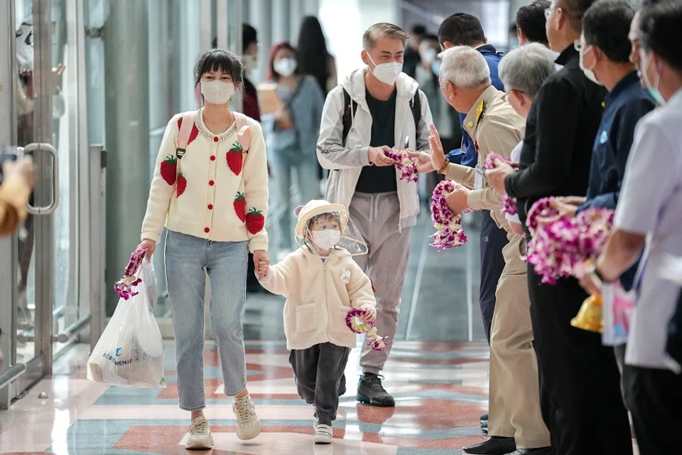 Passengers from China's Xiamen arrive at Bangkok's Suvarnabhumi airport after China reopens its borders amid the Covid-19 pandemic, in Bangkok, Thailand, 9 January 2023. (Athit Perawongmetha/Reuters)