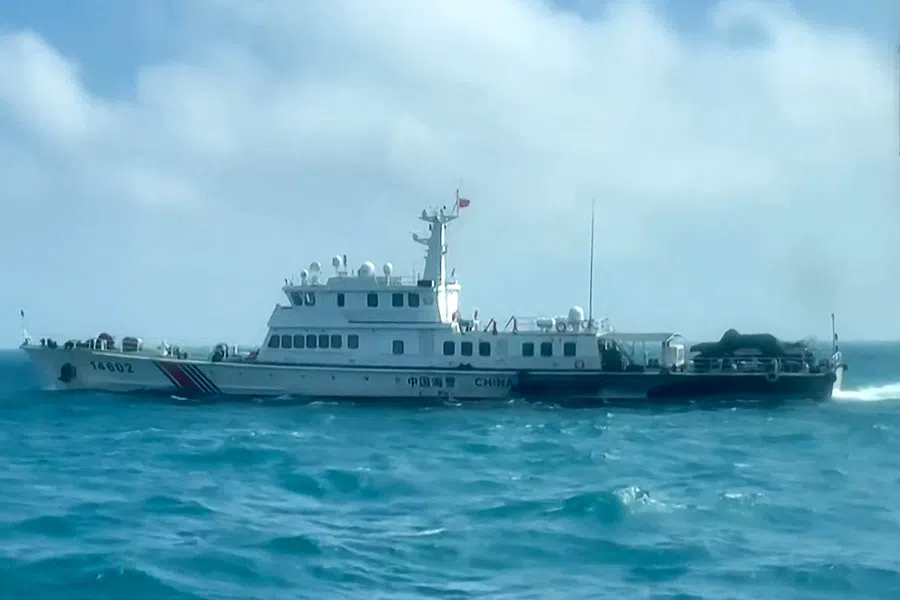 This screengrab from handout video footage taken and released by the Taiwan Coast Guard on 14 October 2024 shows a China Coast Guard vessel near Taiwan’s outlying Matsu islands, as seen from a Taiwan coast guard vessel. (Handout/Taiwan Coast Guard/AFP)